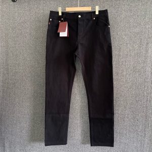 Black embossed denim trousers - L